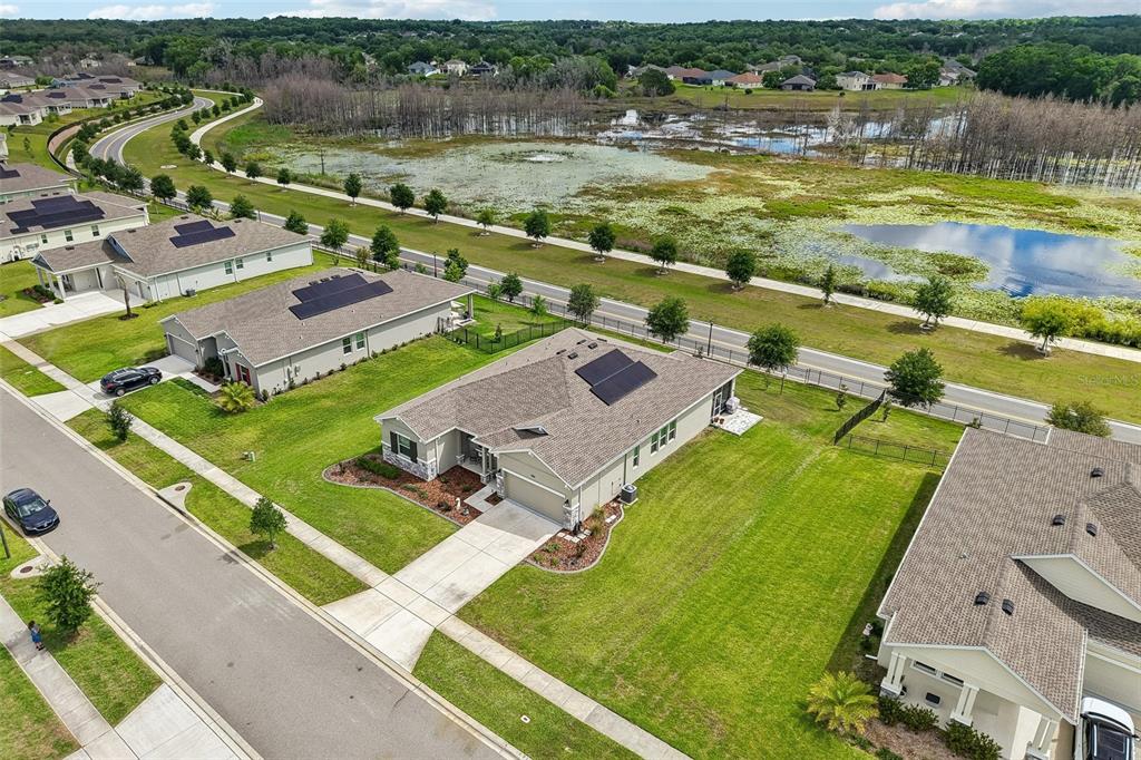 6049 Claystone Way Mount Dora, FL 32757 - Photo 46 of 55 an aerial view of a city