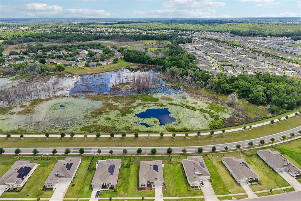 6049 Claystone Way Mount Dora, FL 32757 - Photo 51 of 55 a view of outdoor space tennis court