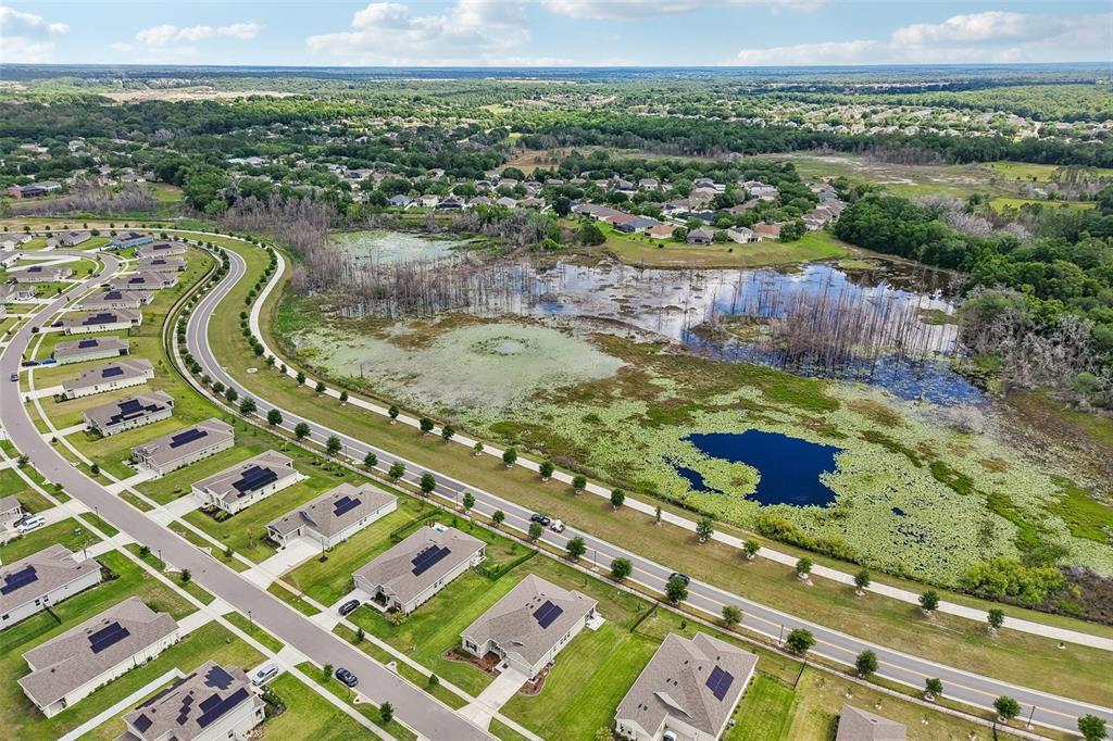 6049 Claystone Way Mount Dora, FL 32757 - Photo 52 of 55 a view of a city