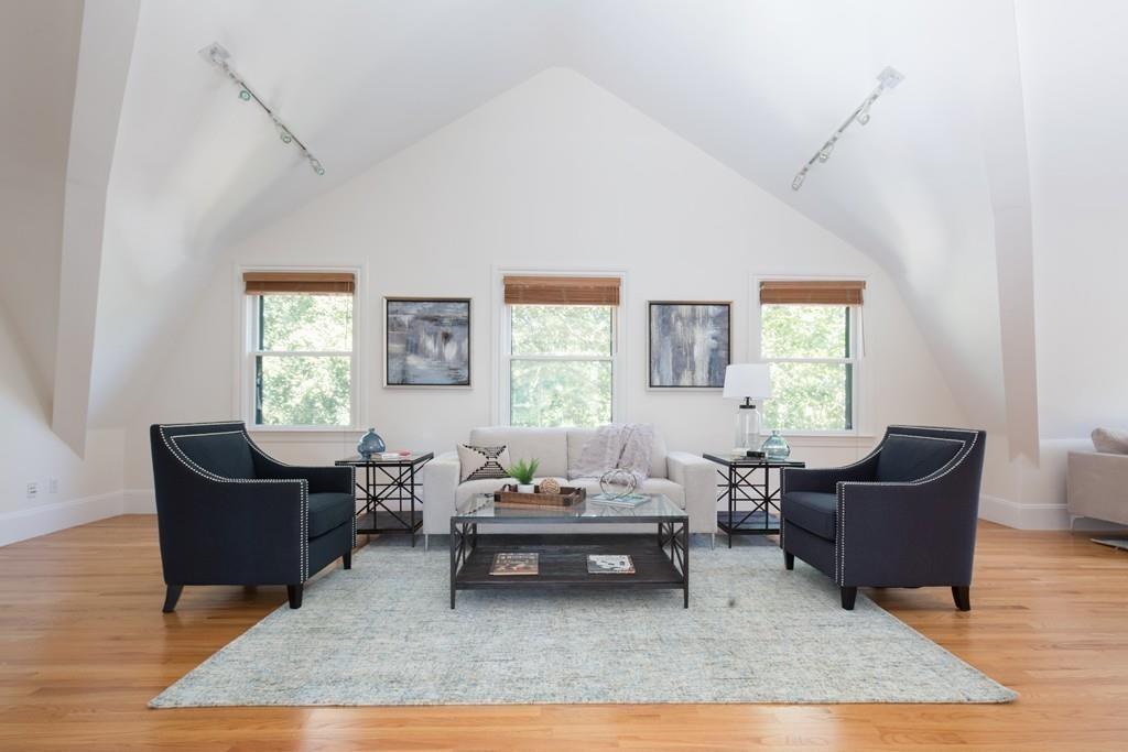 11 Channing Street Cambridge, MA 02138 - Photo 12 of 14 a living room with furniture rug and window