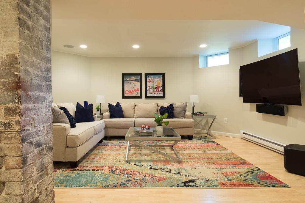 11 Channing Street Cambridge, MA 02138 - Photo 13 of 14 a living room with furniture and a flat screen tv
