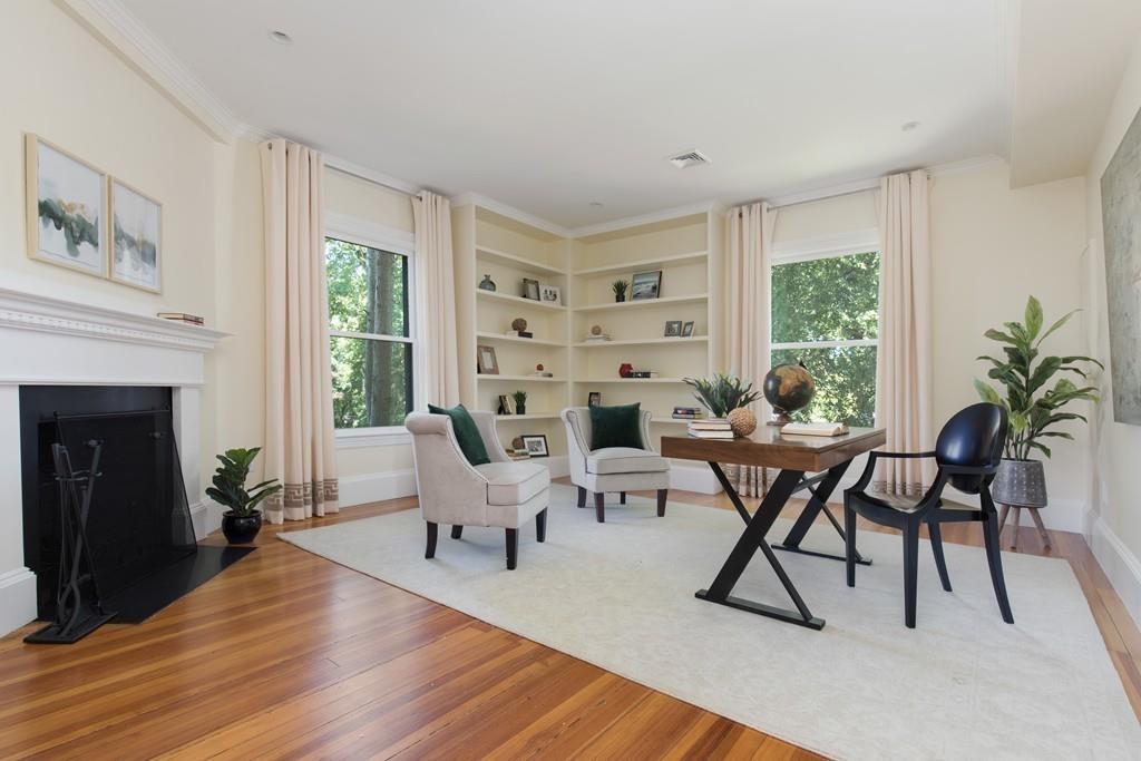 11 Channing Street Cambridge, MA 02138 - Photo 8 of 14 a living room with furniture and a fireplace