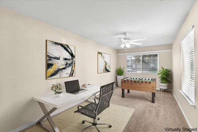 a view of an empty room with a window