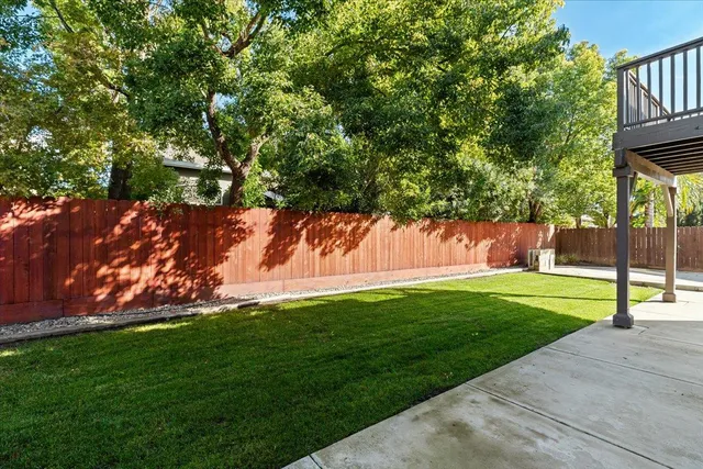 a view of a lake in middle of forest