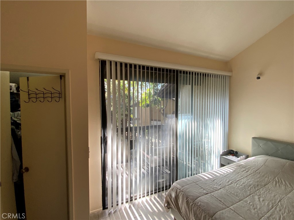4140 Workman Mill Road, Unit 172 Whittier, CA 90601 - Photo 12 of 21 a bedroom with a bed and a window