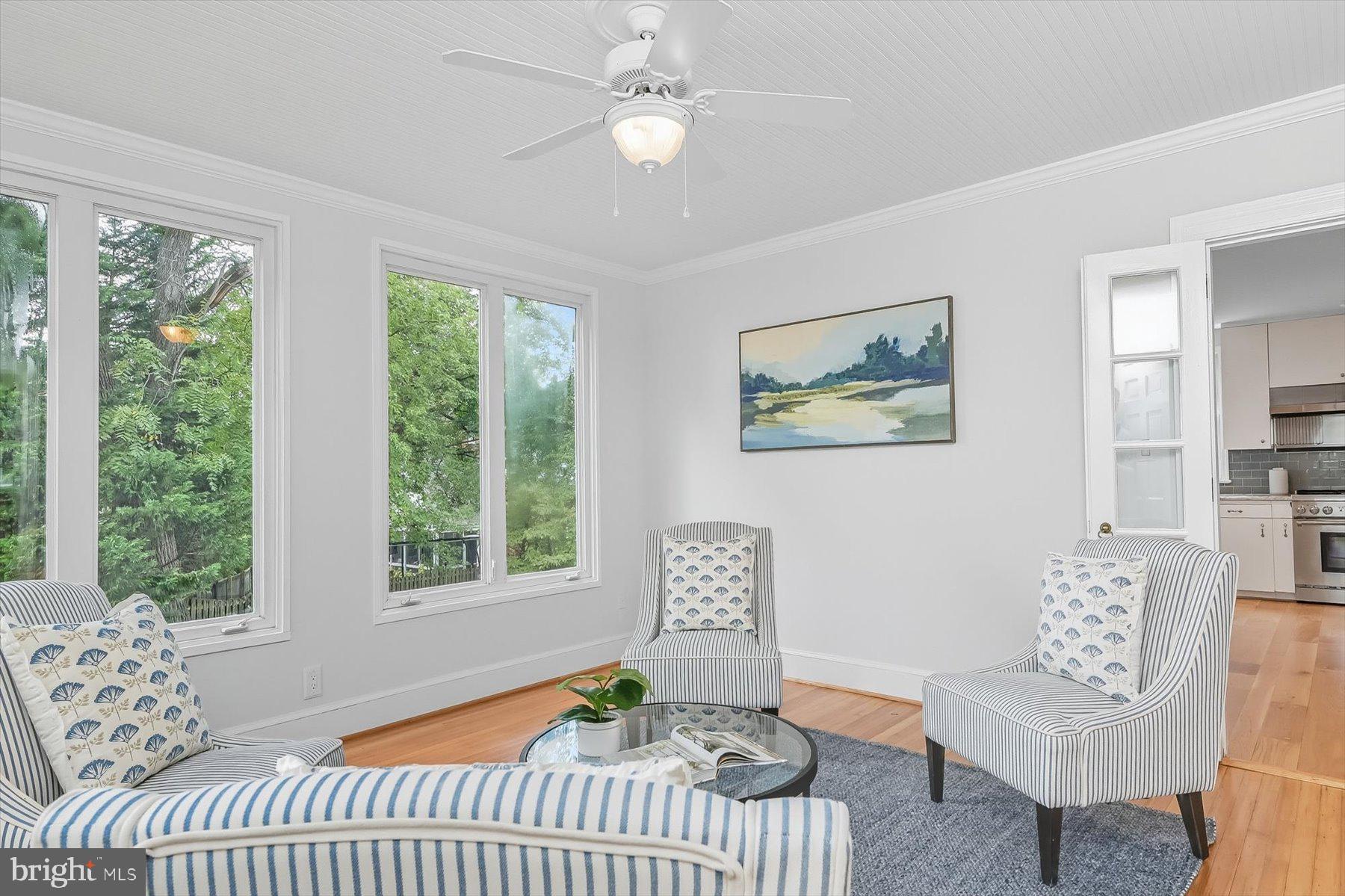 6302 Broad Branch Road Chevy Chase, MD 20815 - Photo 11 of 55 a living room with furniture and a window