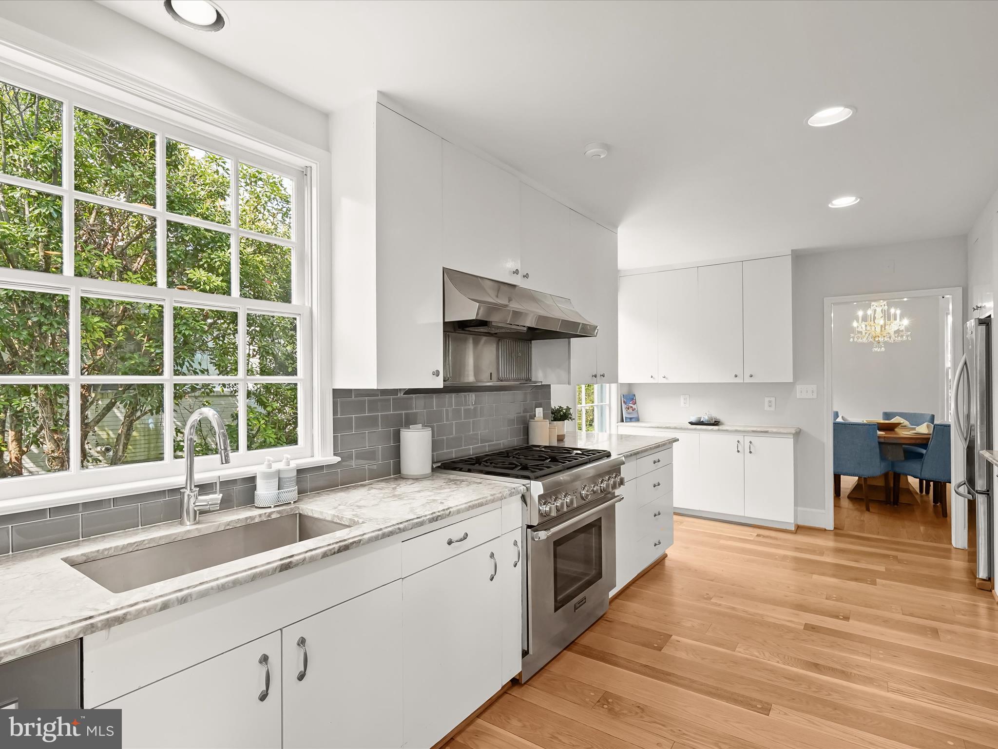6302 Broad Branch Road Chevy Chase, MD 20815 - Photo 17 of 55 a kitchen that has a sink and a stove