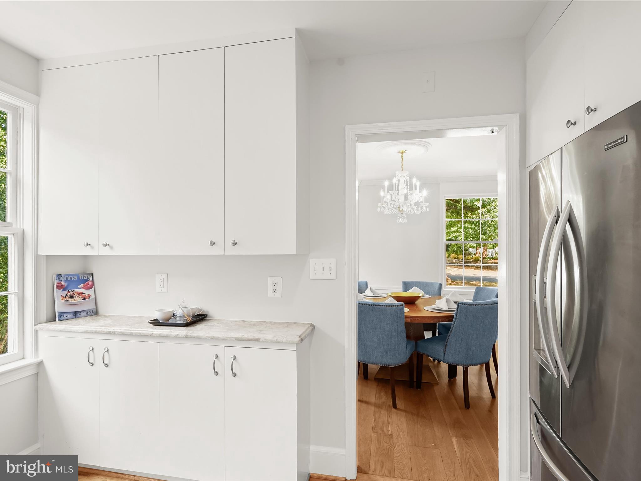 6302 Broad Branch Road Chevy Chase, MD 20815 - Photo 18 of 55 a view of kitchen with stainless steel appliances granite countertop a refrigerator and a stove top oven
