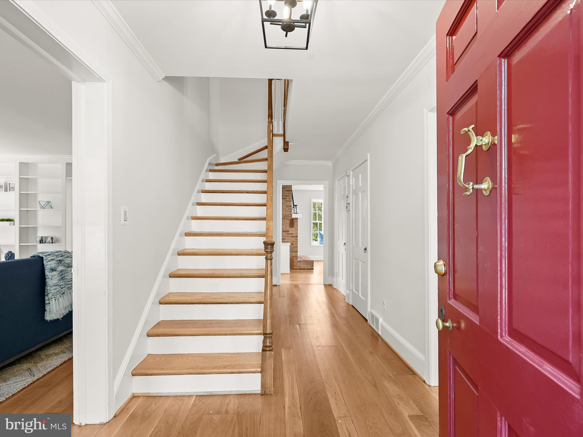 6302 Broad Branch Road Chevy Chase, MD 20815 - Photo 2 of 55 a view of a hallway with wooden floor and entryway