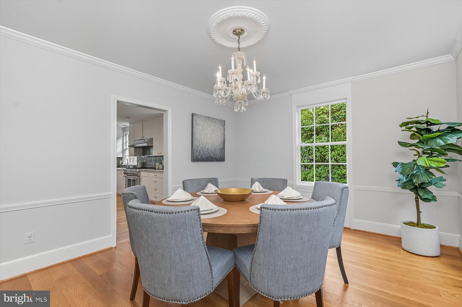 6302 Broad Branch Road Chevy Chase, MD 20815 - Photo 22 of 55 a view of a dining room with furniture window and wooden floor