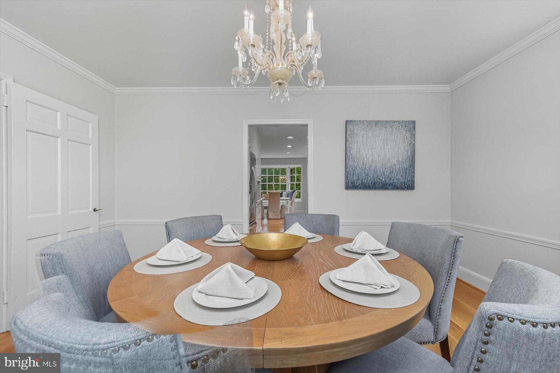 6302 Broad Branch Road Chevy Chase, MD 20815 - Photo 23 of 55 a table and chairs in a dining room