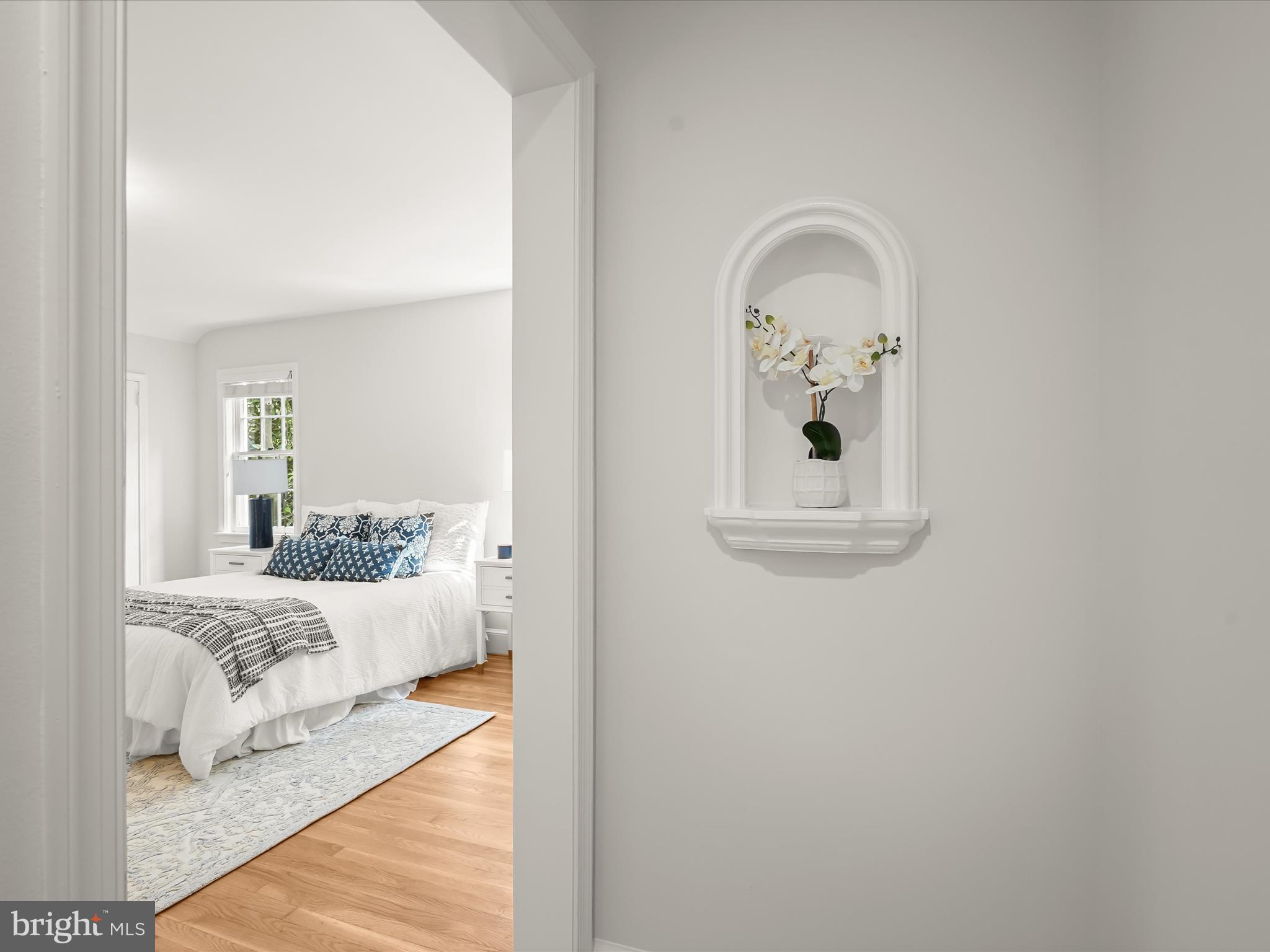 6302 Broad Branch Road Chevy Chase, MD 20815 - Photo 25 of 55 a bedroom with a bed and a window