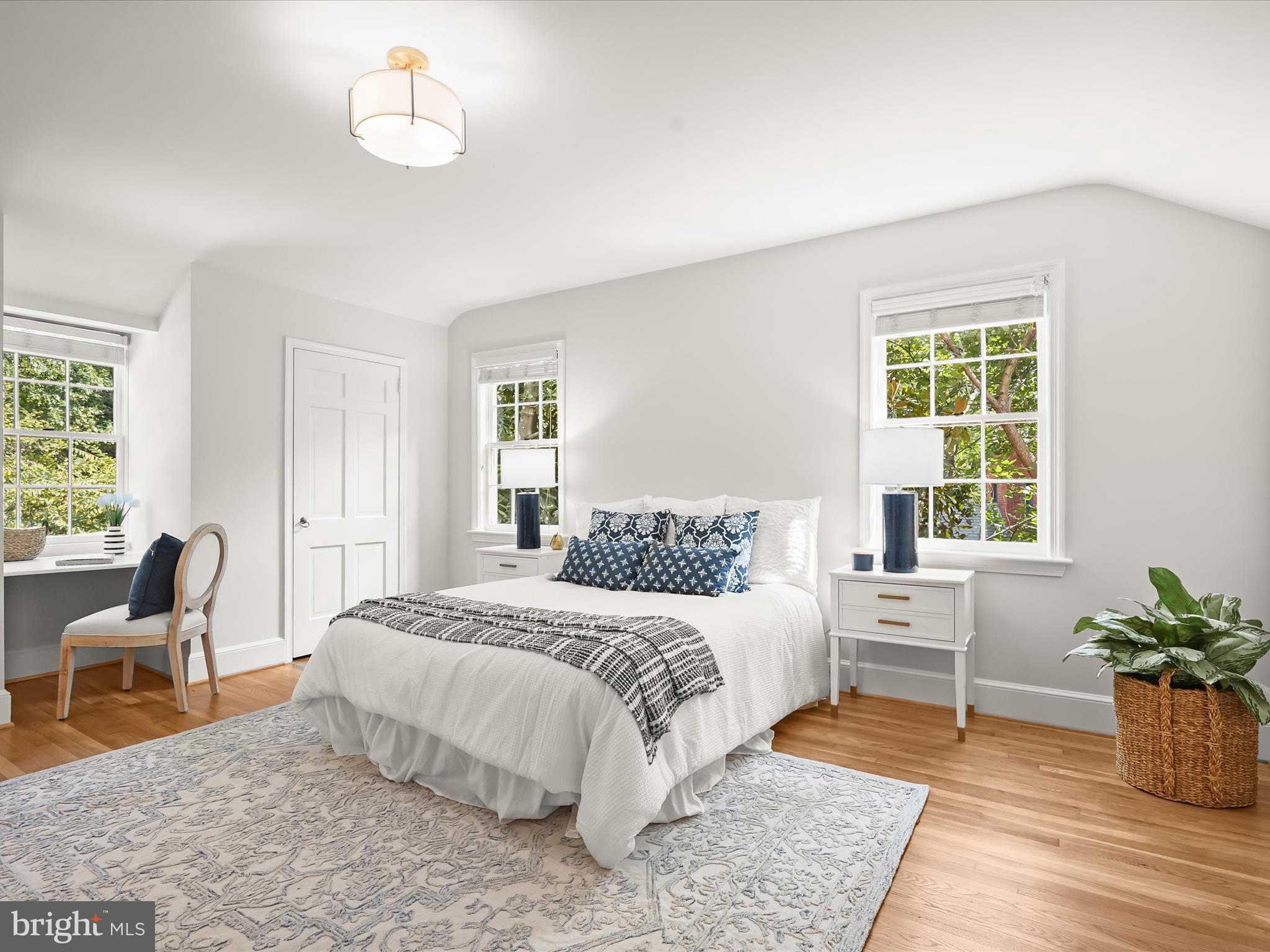 6302 Broad Branch Road Chevy Chase, MD 20815 - Photo 26 of 55 a bedroom with a bed chair and window
