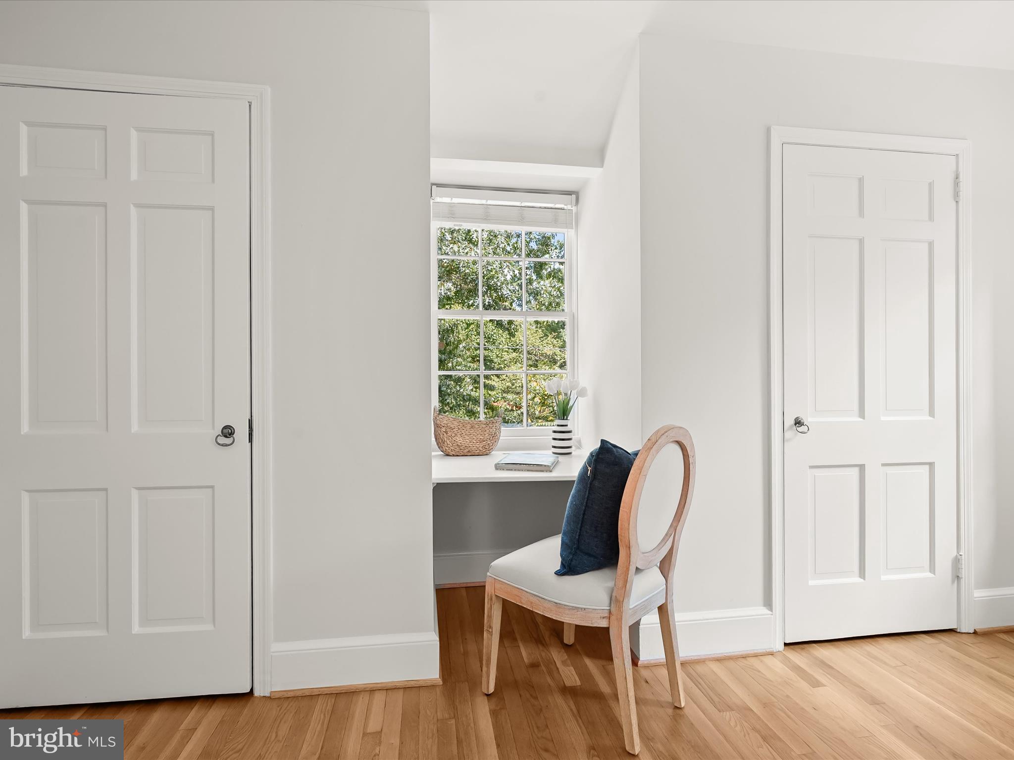 6302 Broad Branch Road Chevy Chase, MD 20815 - Photo 29 of 55 a view of a workspace room with wooden floor lounge chair and windows