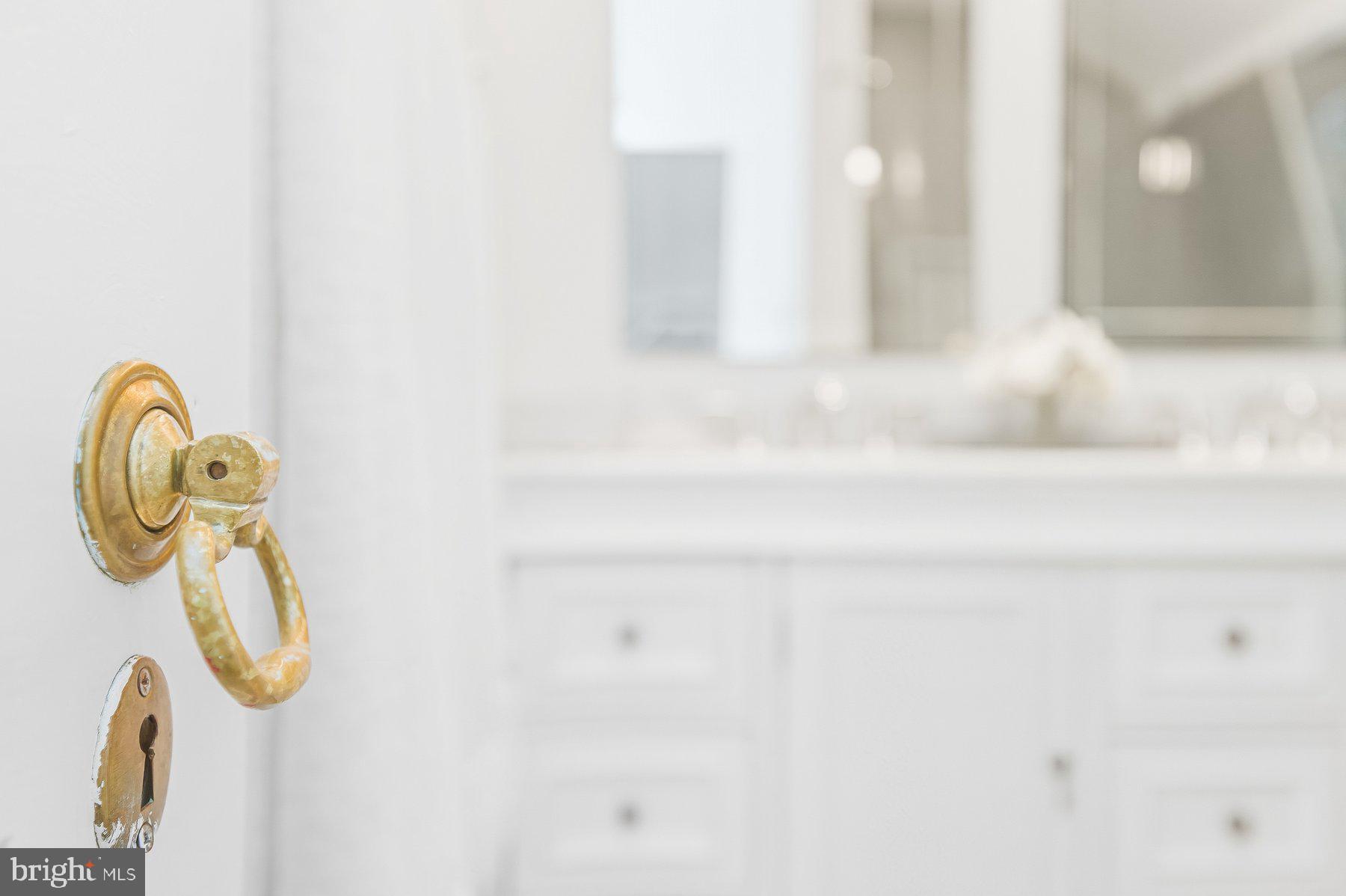 6302 Broad Branch Road Chevy Chase, MD 20815 - Photo 31 of 55 a picture of a bathroom with a sink