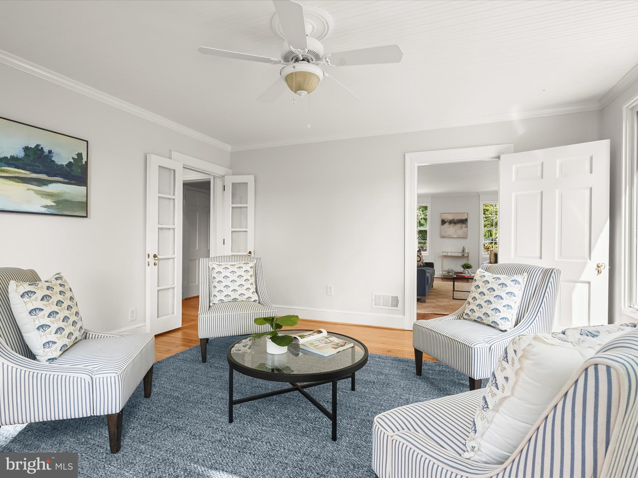6302 Broad Branch Road Chevy Chase, MD 20815 - Photo 9 of 55 a living room with furniture and a table