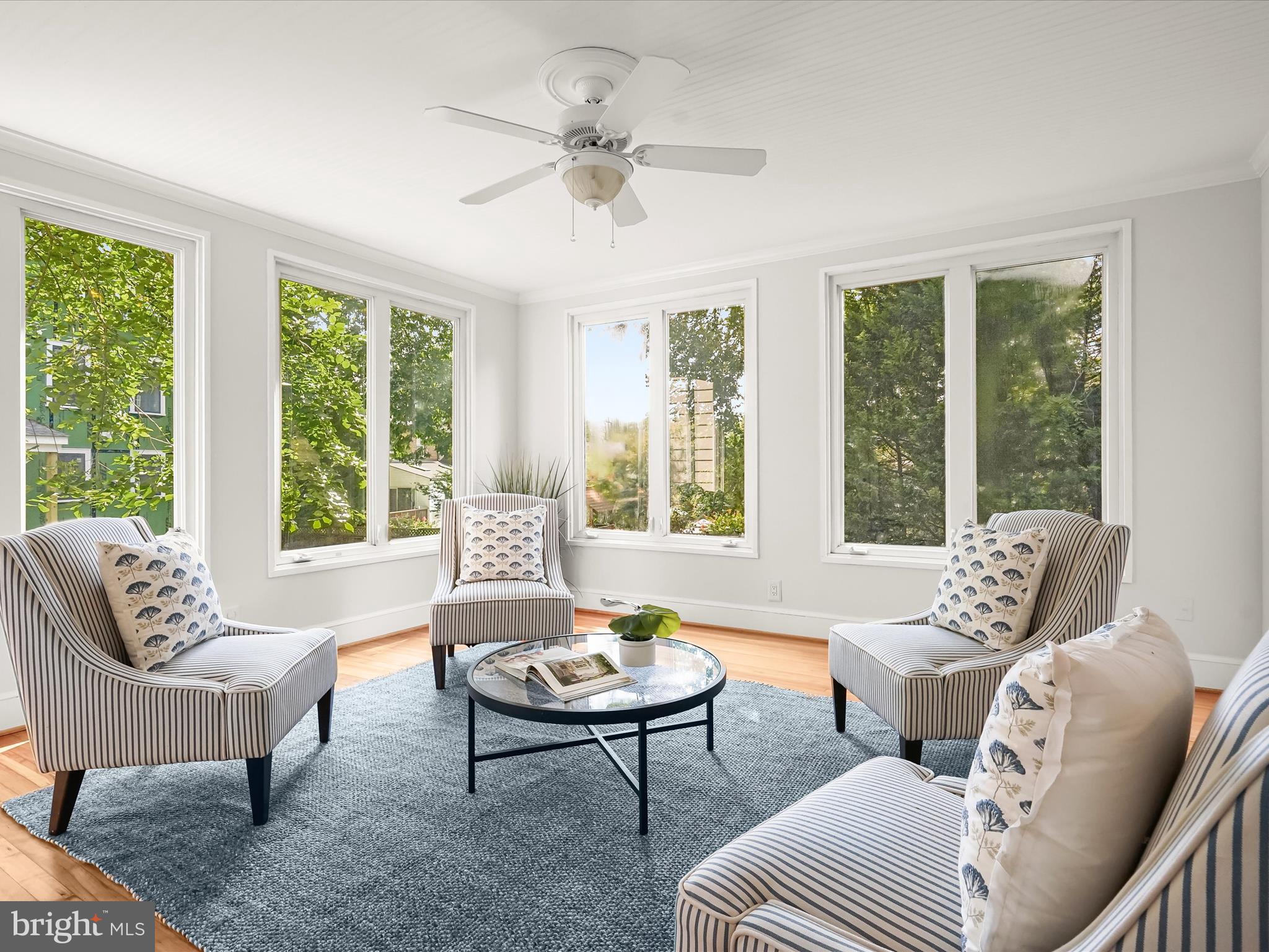 6302 Broad Branch Road Chevy Chase, MD 20815 - Photo 10 of 55 a living room with furniture and a large window