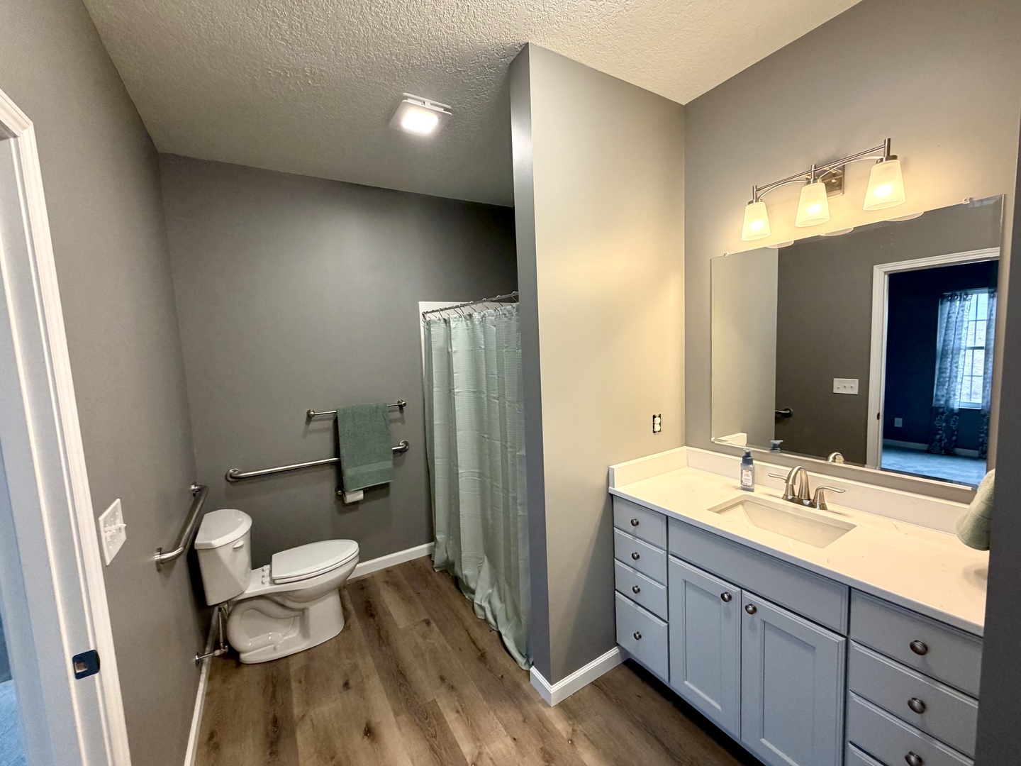 137 Countryview Court Aledo, IL 61231 - Photo 11 of 20 a bathroom with a double vanity sink toilet and shower