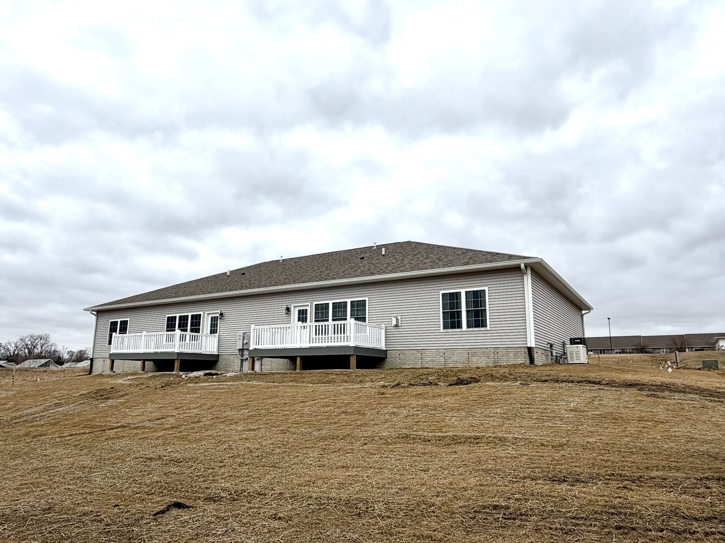 137 Countryview Court Aledo, IL 61231 - Photo 10 of 20 a view of house with swimming pool outdoor seating