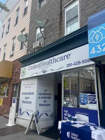 a view of a building with sitting area