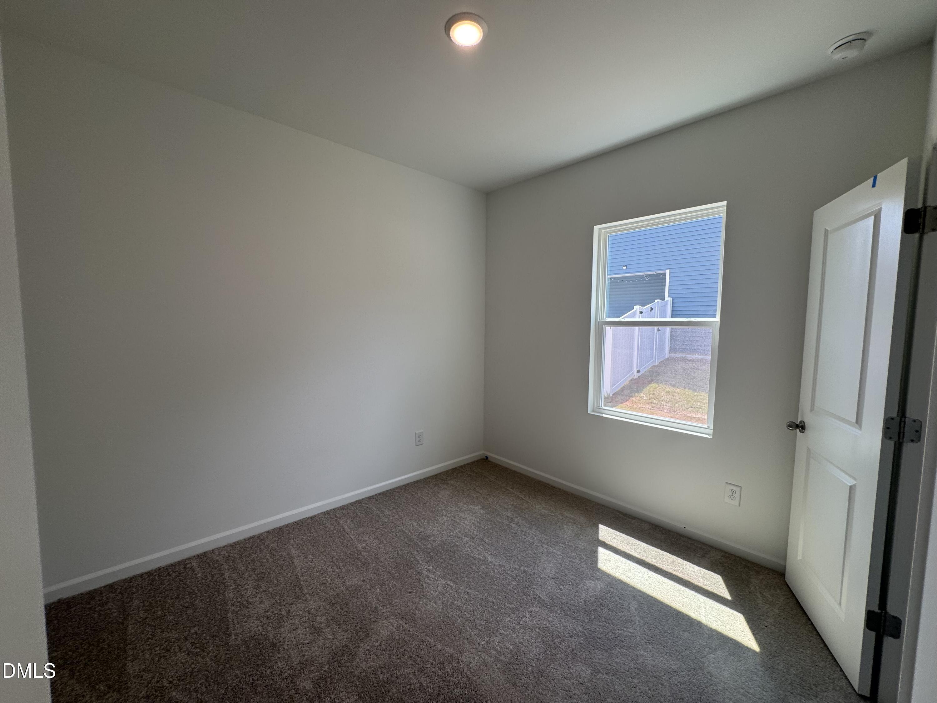 11754 Salers Loop Middlesex, NC 27557 - Photo 13 of 21 an empty room with windows