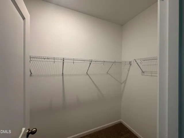 a view of small space with racks on the wall