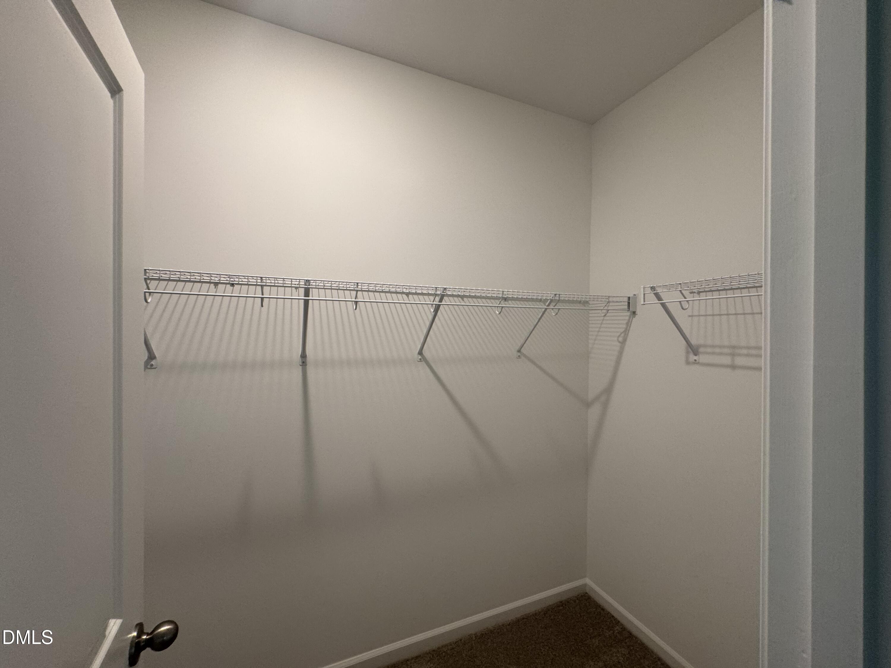 11754 Salers Loop Middlesex, NC 27557 - Photo 9 of 21 a view of small space with racks on the wall