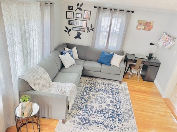 6 Saugus Avenue, Unit A Saugus, MA 01906 - Photo 7 of 26 a living room with furniture and a rug