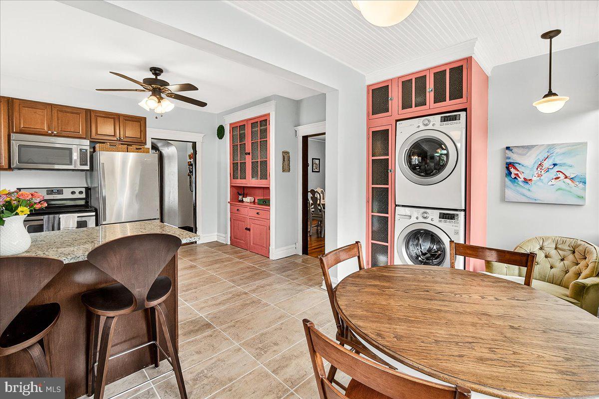 144 South Main Street Boonsboro, MD 21713 - Photo 18 of 48 a view of a kitchen with washer and dryer