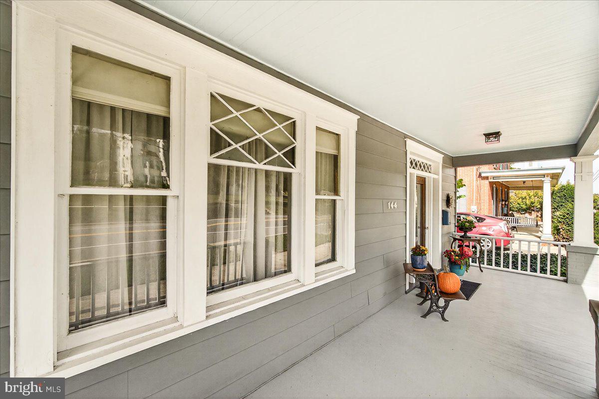 144 South Main Street Boonsboro, MD 21713 - Photo 5 of 48 a living room filled with furniture and a large window