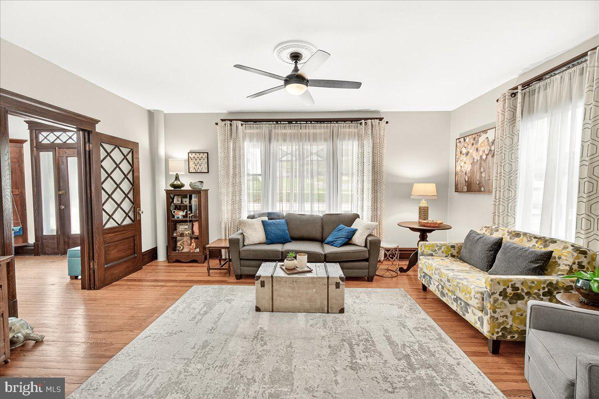 144 South Main Street Boonsboro, MD 21713 - Photo 9 of 48 a living room with furniture and a large window
