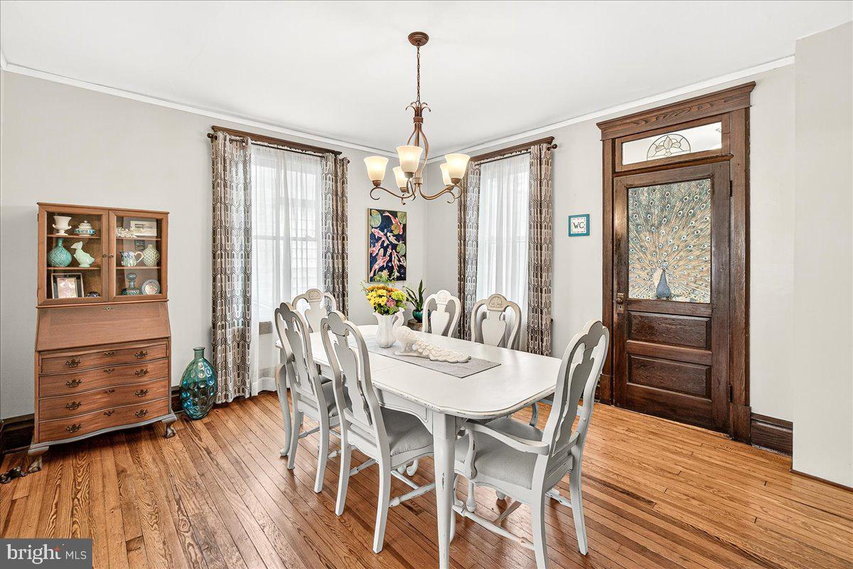 144 South Main Street Boonsboro, MD 21713 - Photo 10 of 48 a view of a dining room with furniture window and wooden floor