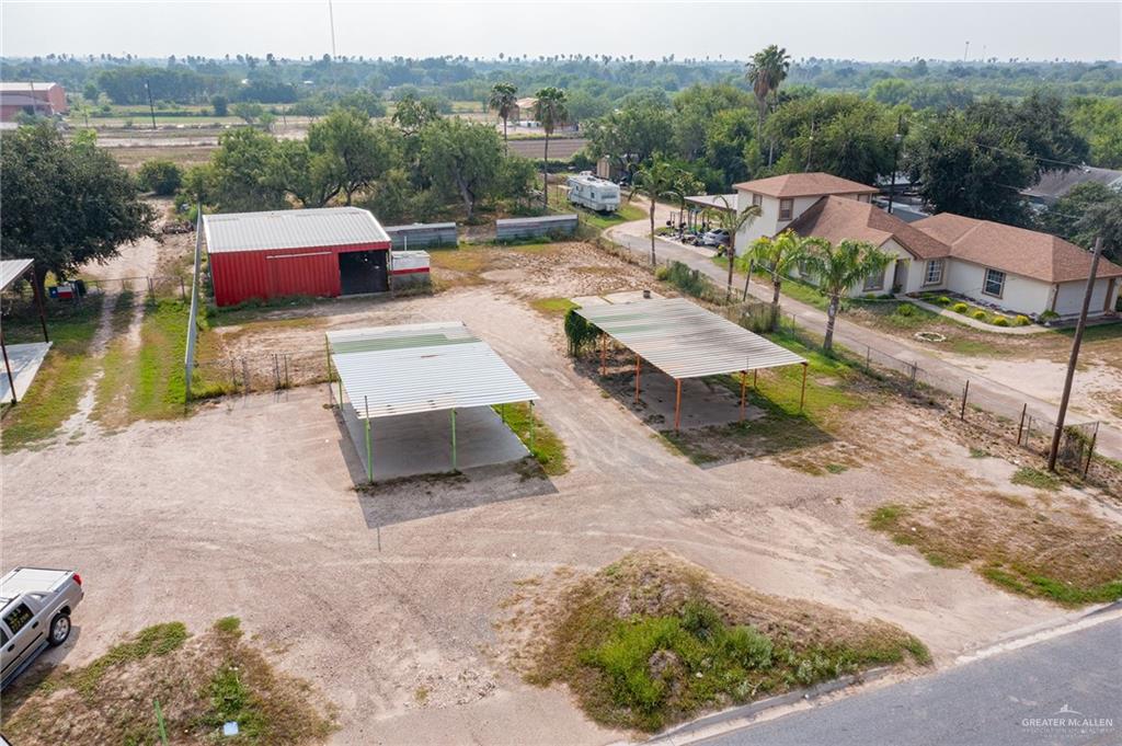 6106 North La Homa Road Mission, TX 78574 - Photo 2 of 10 a view of a lake with a yard