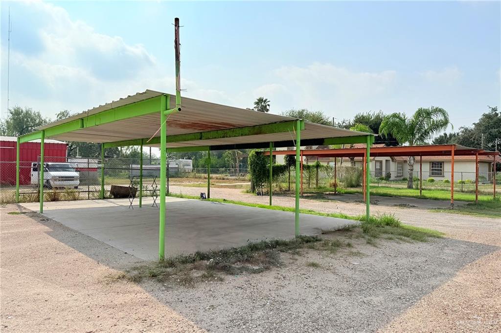 6106 North La Homa Road Mission, TX 78574 - Photo 5 of 10 a backyard of a house with a garden and barbeque oven
