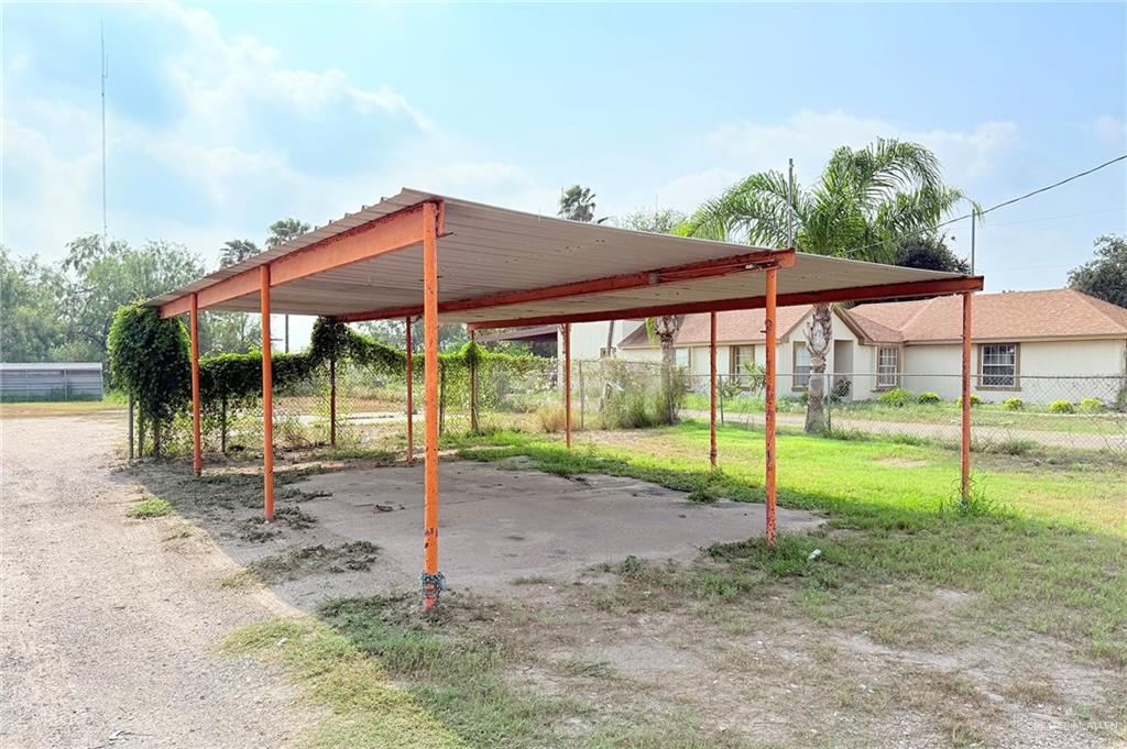 6106 North La Homa Road Mission, TX 78574 - Photo 6 of 10 a backyard of a house with swing and table