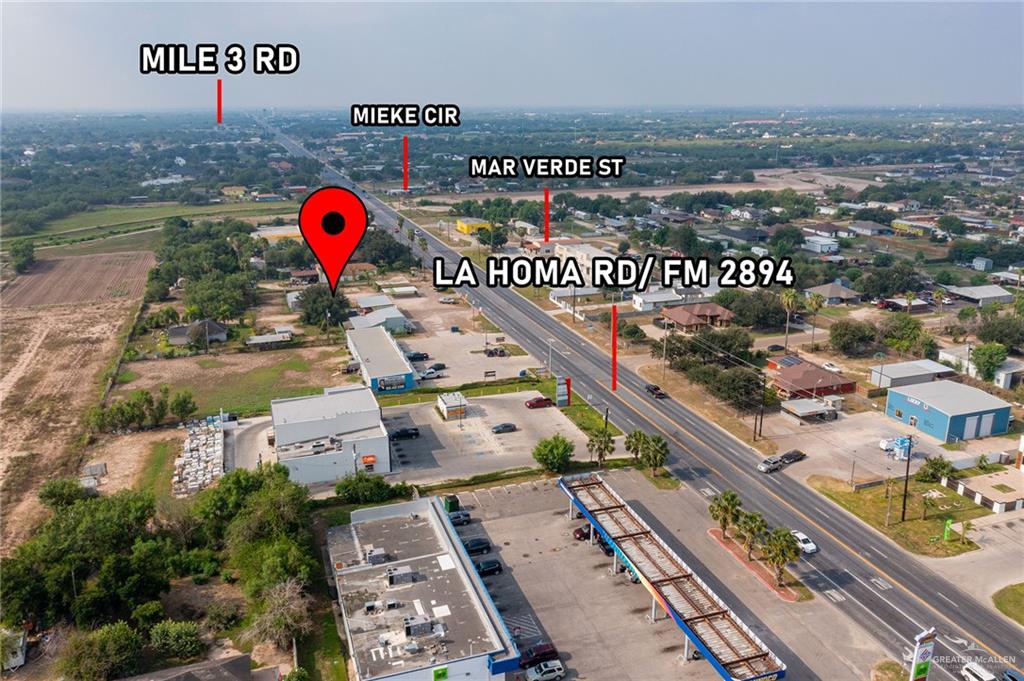 6106 North La Homa Road Mission, TX 78574 - Photo 10 of 10 an aerial view of a swimming pool and outdoor space