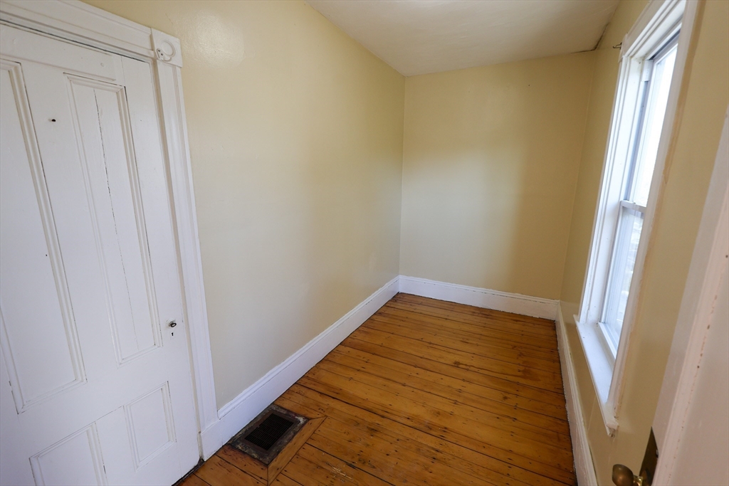 35 Clarkson Street, Unit 2 Boston, MA 02125 - Photo 8 of 9 a view of wooden floor