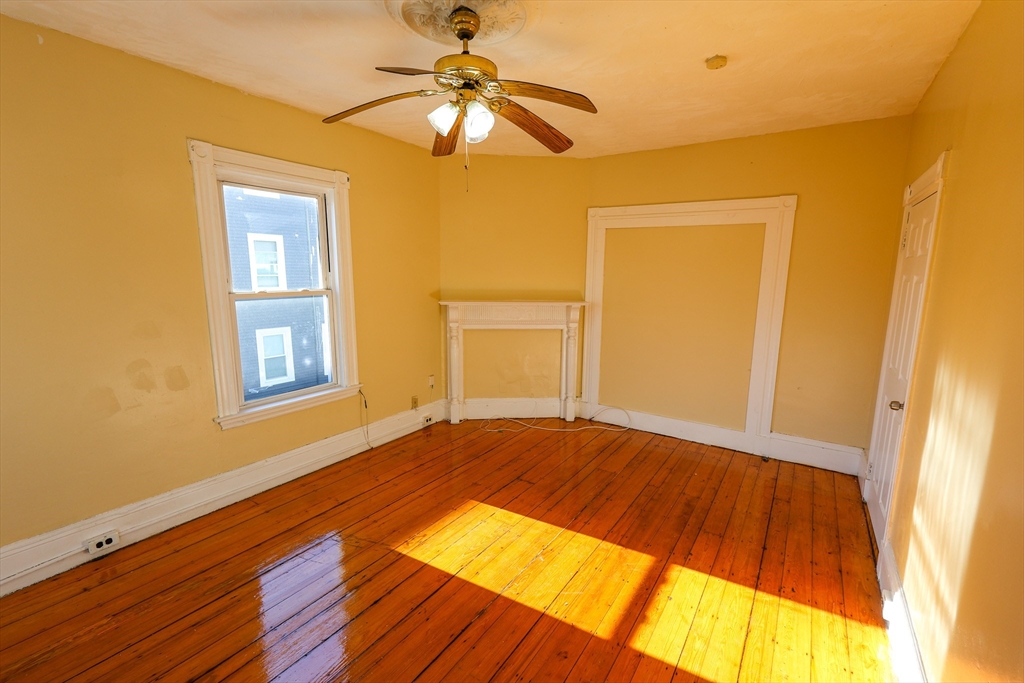 35 Clarkson Street, Unit 2 Boston, MA 02125 - Photo 9 of 9 a view of an empty room with a window