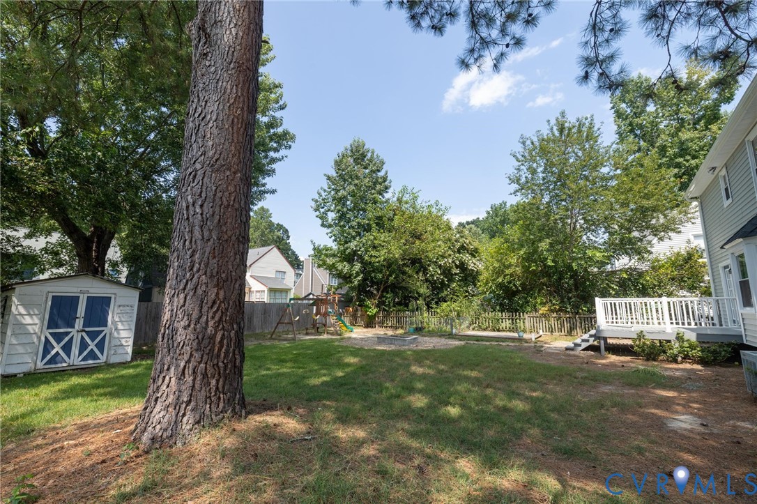 7070 Mill Valley Road Mechanicsville, VA 23111 - Photo 56 of 64 Spacious backyard with a large deck, white railing