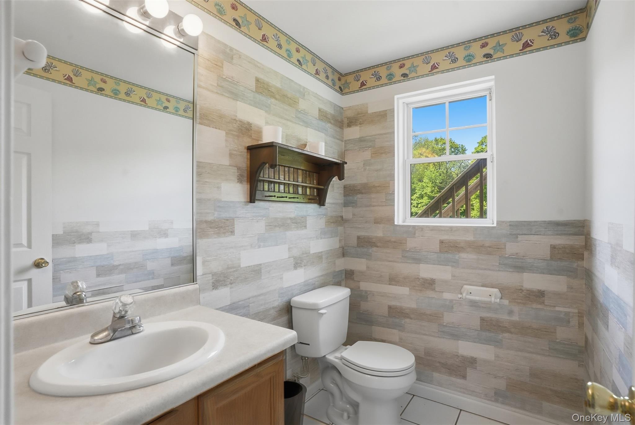 160 Pirog Road Pine Bush, NY 12566 - Photo 28 of 50 a bathroom with a sink a toilet and mirror