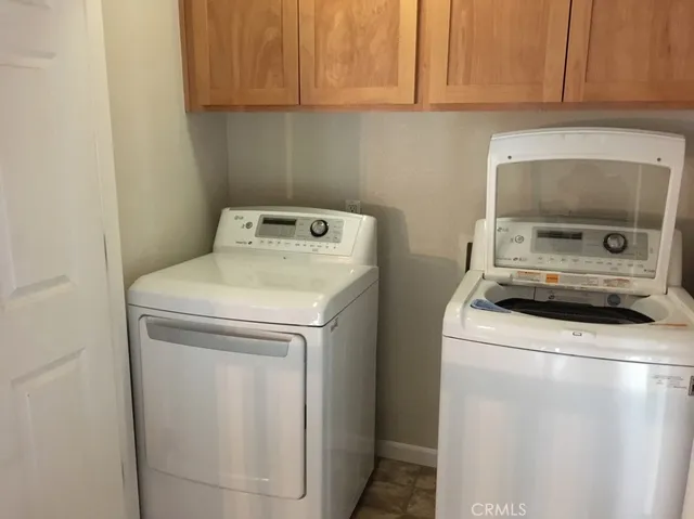 a view of a lake in front of a house