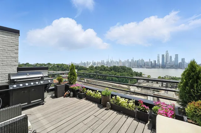 a view of city from roof deck