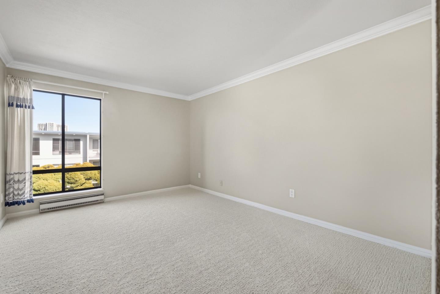8 Commodore Drive, Unit C457 Emeryville, CA 94608 - Photo 19 of 48 an empty room with large window