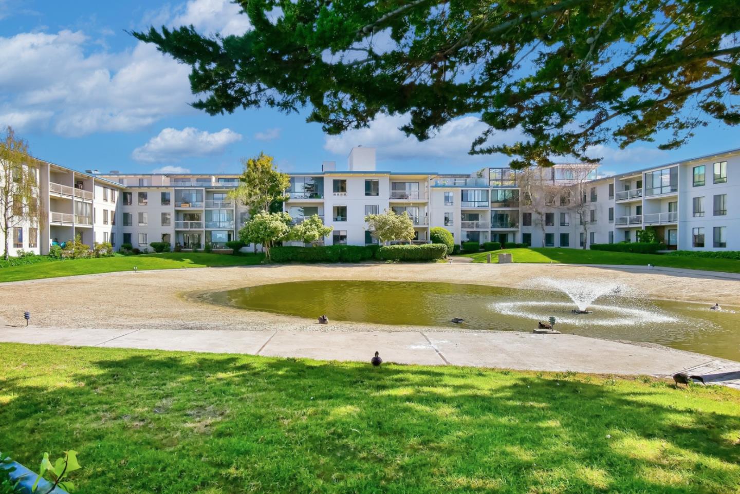 8 Commodore Drive, Unit C457 Emeryville, CA 94608 - Photo 34 of 48 a view of building with a swimming pool