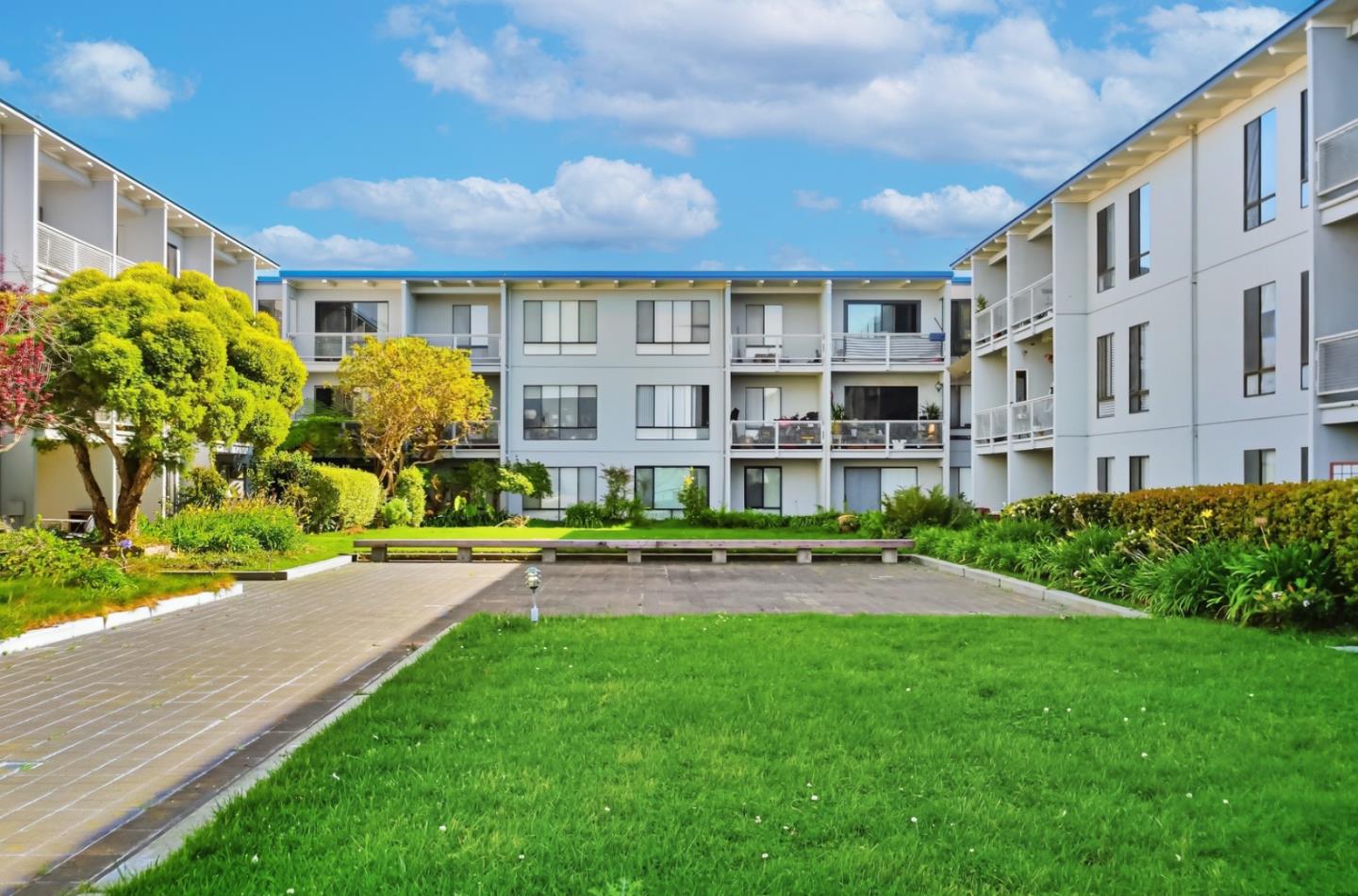 8 Commodore Drive, Unit C457 Emeryville, CA 94608 - Photo 40 of 48 a view of a house with a yard and sitting area