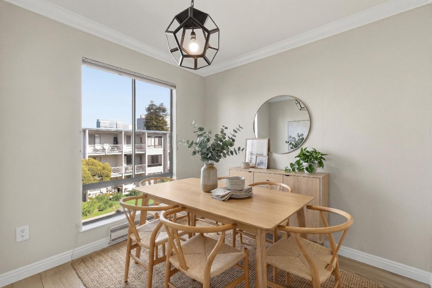 8 Commodore Drive, Unit C457 Emeryville, CA 94608 - Photo 8 of 48 a dining room with furniture and window