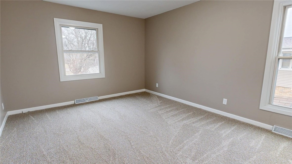 4153 Buckingham Drive Decatur, IL 62526 - Photo 17 of 34 an empty room with a window