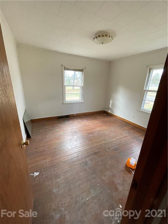 2121 North New Hope Road Gastonia, NC 28054 - Photo 8 of 11 an empty room with windows
