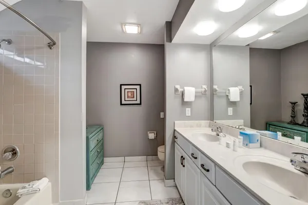 a bathroom with a bath tub and a shower
