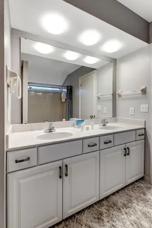 a view of a backyard with table and chairs